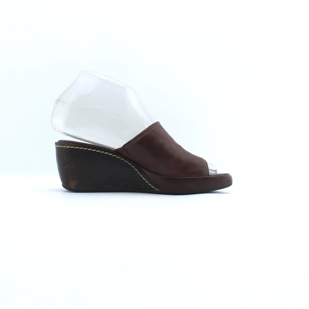 COLE HAAN  .