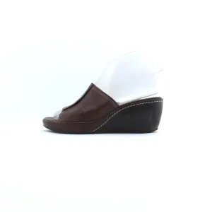 COLE HAAN  .