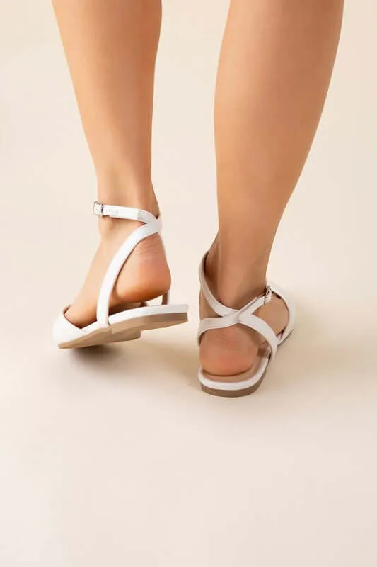 Step Up Your Style with Linden-S Ankle Strap Flats in Black & White